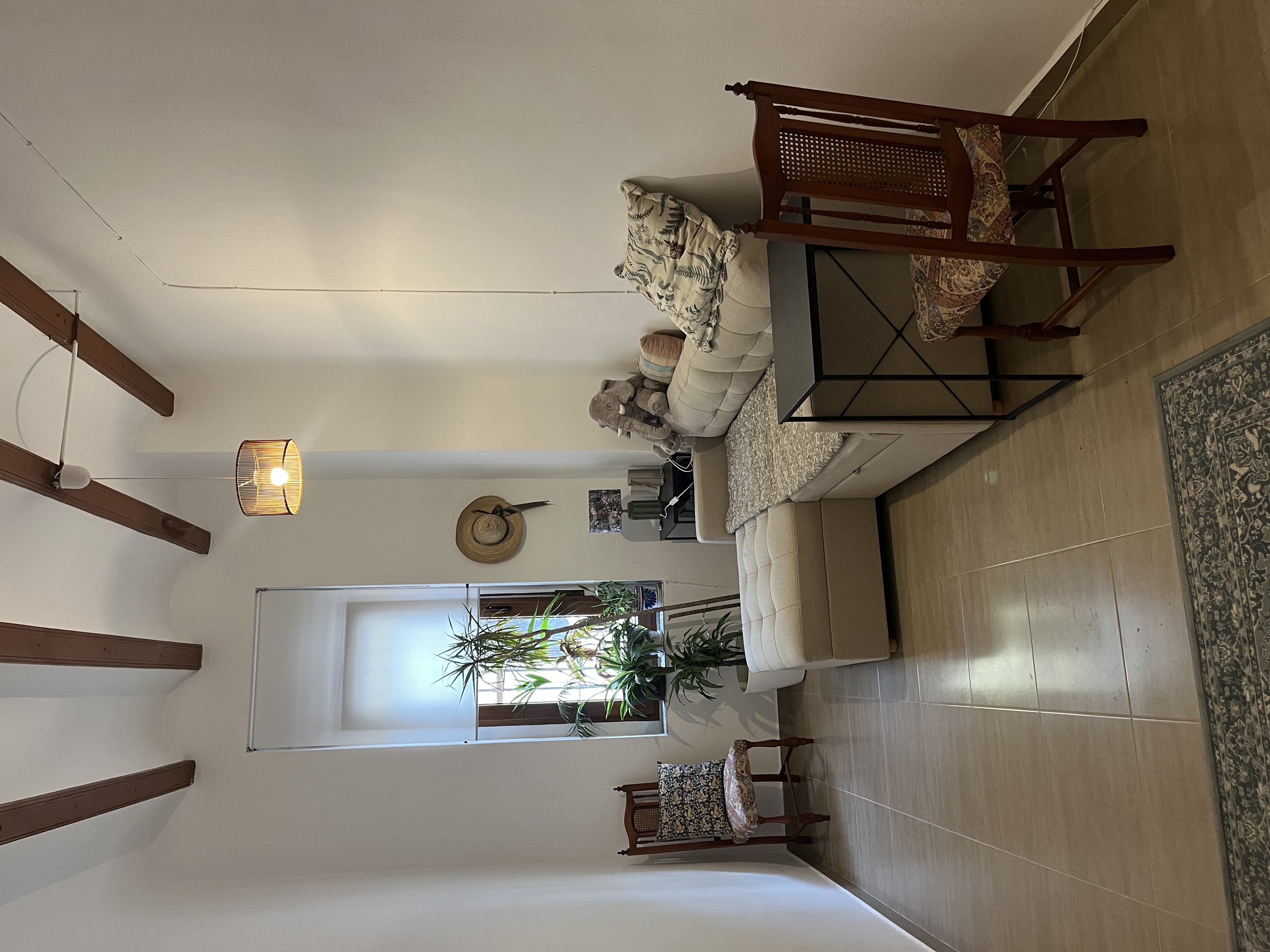 Living room with beamed ceiling